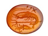 an image of a carving of a dragon and a man on a horse