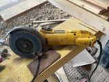 a yellow machine that is sitting on top of a table