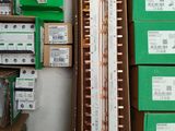 many boxes of electronic equipment in a room