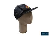 the hat is black and has a red emblem on it