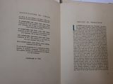 someone is holding a book open to a page with a picture on it