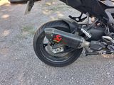 a motorcycle that is parked on the side of the road