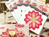 many cards and a glass of wine on the table