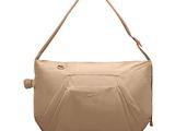an image of a beige purse on a white background