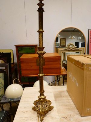 a lamp that is sitting on a table in a room