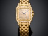 une montre-bracelet en or jaune 18 carats sertie de diamants
