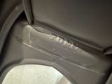 a close up view of a toilet seat with a hole in it