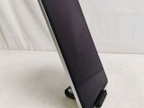 a tablet that is sitting on a stand on the table