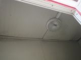 a fan that is on the ceiling of a building