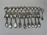 a lot of spoons that are sitting on a table