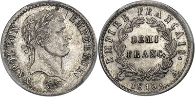 a silver coin with an image of a woman on it