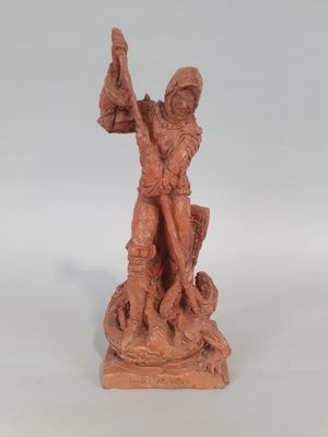 an image of a statue of a man holding a sword