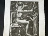 an old black and white photo of a man sitting on a chair next to a woman