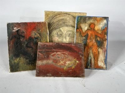 four pieces of art sitting on top of a table next to each other