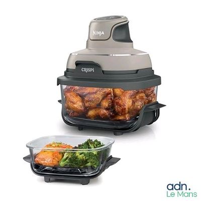 une photo représentant un robot ménager et un saladier rempli d'aliments