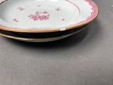 two plates that are sitting on a table