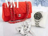 un sac à main rouge et un sac rouge orné d'une bague en diamant