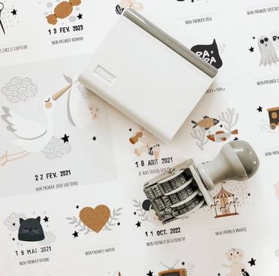a stamper that is sitting on top of a sheet of paper