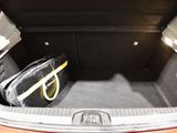 a trunk of a car with luggage in it