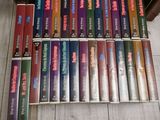 a lot of books in a box on the floor