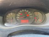 a close up of a car dashboard with a speedometer