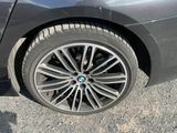 a close up of a car tire on the road