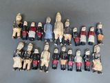 a lot of figurines that are sitting on a table