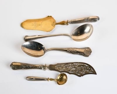 several different types of spoons and spoon spoons on a white surface