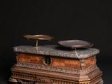 two bowls sitting on top of a box on a table