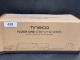 a cardboard box that has a picture of a truck in it