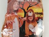 two children in lion costumes are posing for a picture