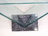 a glass table with a square glass top and a square glass base