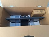 a box with a tv in it that is open