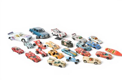 a lot of toy cars that are on a white surface
