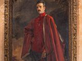 portrait of a man in a red coat with a sword