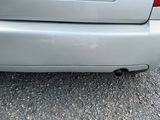 an image of a car that is parked on the side of the road