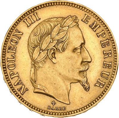 Gros plan sur une pièce d'or portant une tête d'homme