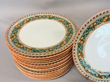 many plates stacked on top of each other on a table