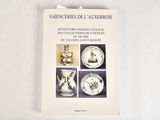 a book on the table with pictures of different objects on it