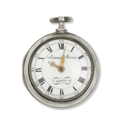 a silver pocket watch with roman numerals on the face