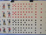 an image of a playing card board with a lot of playing cards on it