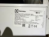 a close up of a washing machine with a label on it