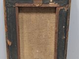an old wooden picture frame with a burlock cloth backing