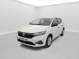 Une voiture blanche est garée dans une pièce blanche au sol blanc.