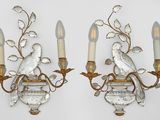 pair of antique wall sconces with birds on them