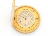 an image of a gold pocket watch on a white background