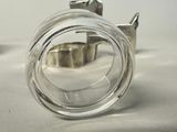 a close up of a glass object with a ring on it