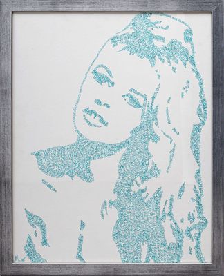 framed art print of a woman ' s face in blue glitter