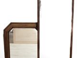 a mirror that is sitting on the floor in front of a mirror
