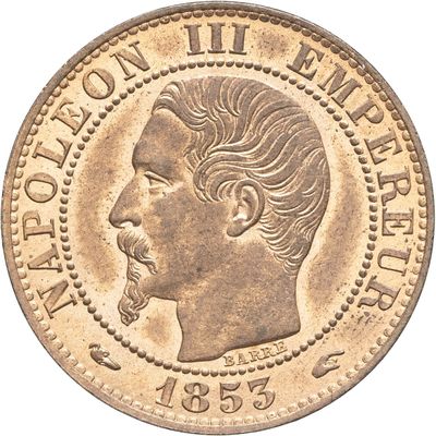 Gros plan sur une pièce de monnaie portant le visage d'un homme